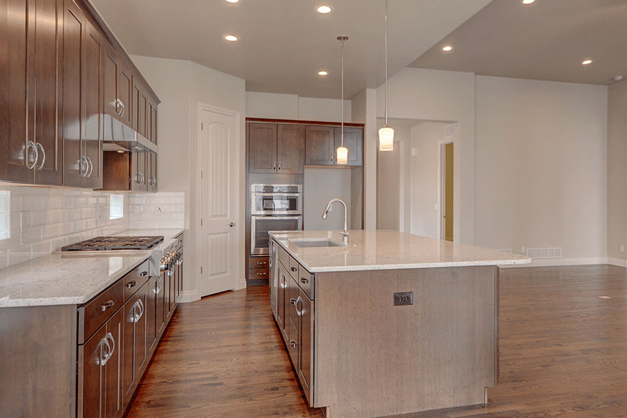 saddletree-custom-home-floorplan-cratfsman-design-kitchen-view